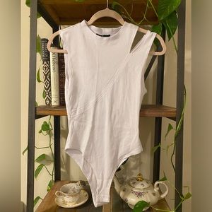 7 For All Man Kind Assymetrical BodySuit Size:xs
